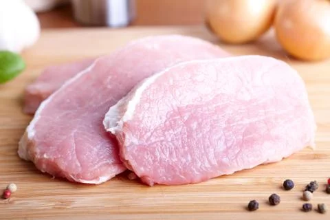 Raw pork chops Stock Photos