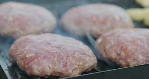 Raw Pork Cutlets Fried with Smoke on Grill, Grilled Minced Meat on Mangal, B-B-Q Stock Footage 131776496