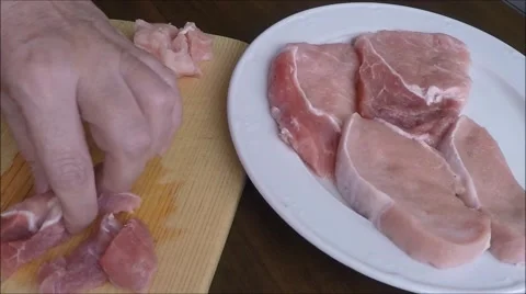 Raw pork on cutting board Video stock 46991222