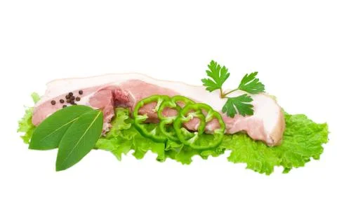 Raw pork with green vegetable Stock Photos