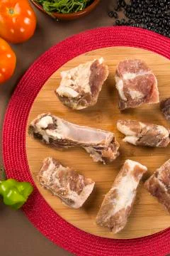 Raw pork rib on wooden background Stock Photos