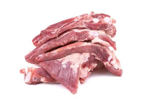 Raw pork ribs are isolated on a white background.Preparation of meat dishes. Stock Photos