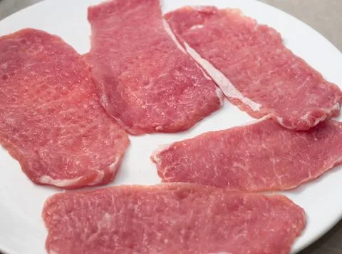 Raw Pork Slices Stock Photos