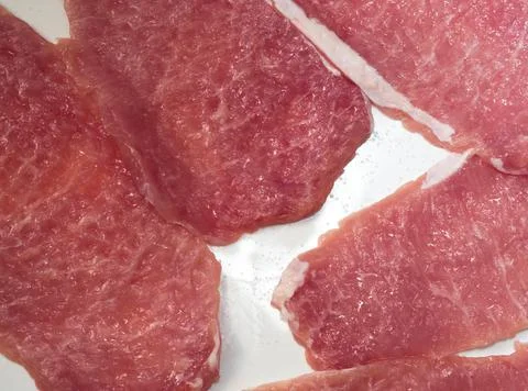 Raw Pork Slices Stock Photos