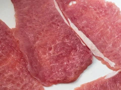 Raw Pork Slices Stock Photos