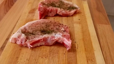 Raw pork steaks Stock Footage 236917260