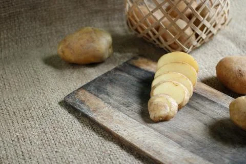 Raw of Potato with bright background Stock Photos