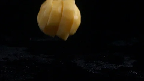 Raw potato isolated on black background Stock Footage 121783139