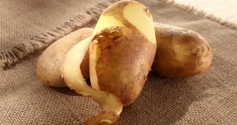 Raw potatoes on burlap. fresh vegetables in rustic style. farm product. Stock Footage 243773915