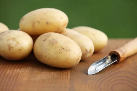 Raw potatoes Stock Photos