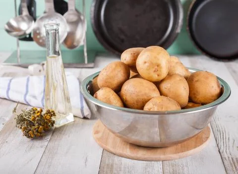 Raw potatoes Stock Photos