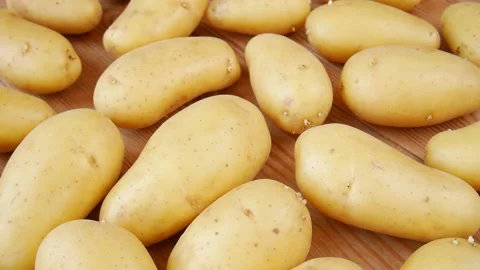 Raw potatoes on the table. Stock Footage 238722159