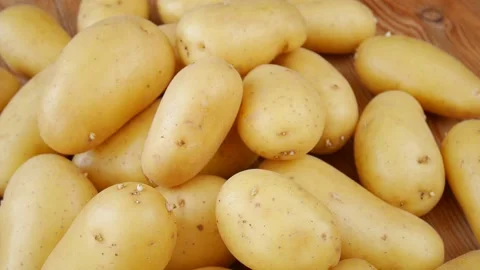 Raw potatoes on the table. Stock Footage 239170209