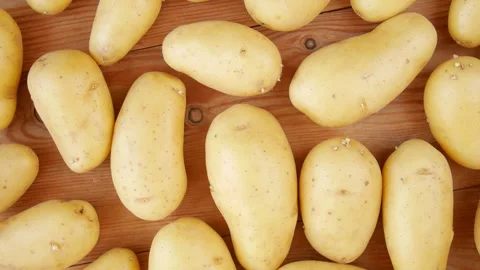 Raw potatoes on the table. 스톡 동영상 248035908