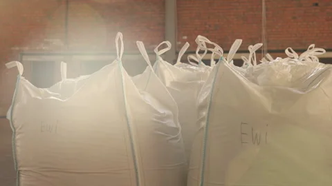 Raw products, Sack placement, Material handling Stock Footage 243226488