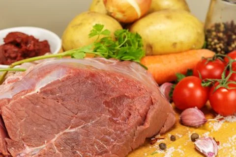 Raw pulp of pork and vegetables for the preparation of a Russian dish Stock Photos