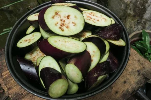 Raw purple eggplants Stock Photos