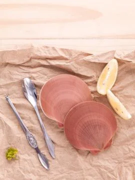 Raw queen scallops with lemon slice ,fork and spoon preparing for grill top v Stock Photos