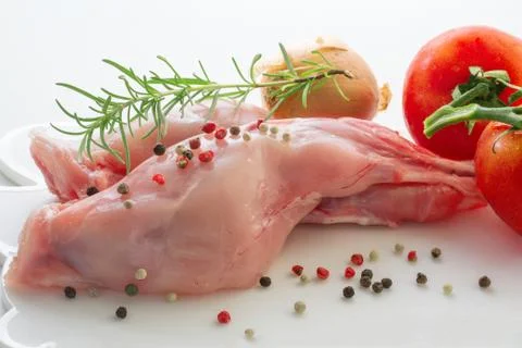 Raw rabbit meat with vegetables Stock Photos
