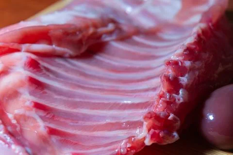 Raw Rack of Lamb Ribs Ready for Cooking with Visible Fat and Bone Macro Foo.. Stock Photos