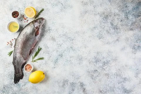 Raw rainbow trout light background Stock Photos