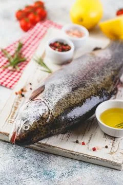 Raw rainbow trout light background Stock Photos