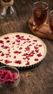 Raw raspberry pie on the wooden table Stock Photos