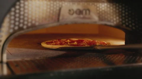 Raw Ready To Bake Pizza Is Placed In Oven. Stock Footage 262619606
