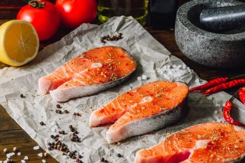 Raw Red Fish and Some Spices. Stock Photos