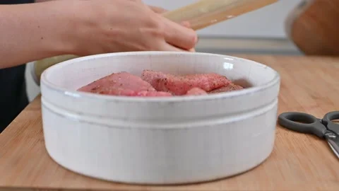 Raw red meat for steaks or grill, barbecue. Sliced beef for a delicious dinner. Video stock 130172383