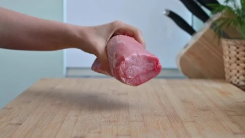 Raw red meat for steaks or grill, barbecue. Sliced beef for a delicious dinner. Video stock 130172653