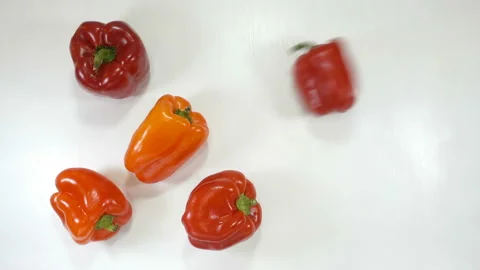 Raw red ripe peppers roll in 4K Stock Footage 139485490