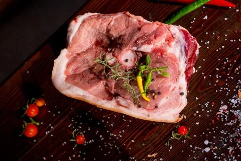 Raw rib eye beef steak on a black background Stock Photos
