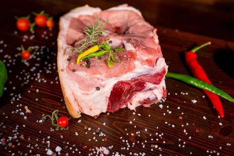 Raw rib eye beef steak on a black background Stock Photos
