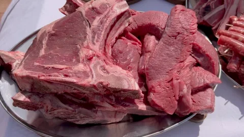 Raw rib-eye steak, steaks and sausage Video stock 271592361