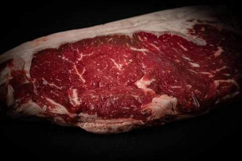 Raw ribeye beef steak. Texture of marble meat Stock Photos