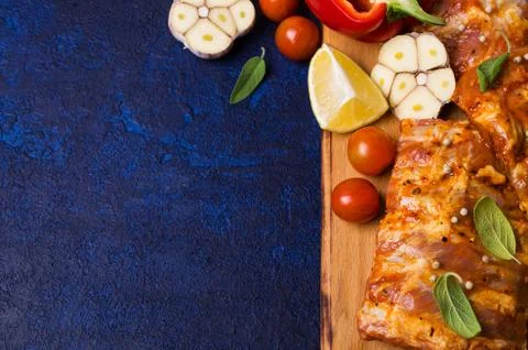 Raw ribs in marinade Stock Photos