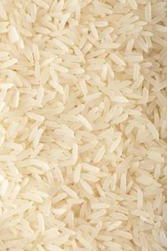 Raw rice backround Stock Photos