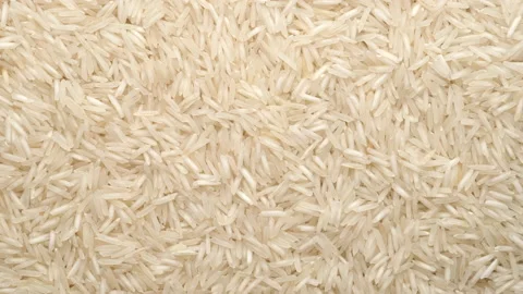 Raw rice basmati rotating top view Stock-Footage 135862363