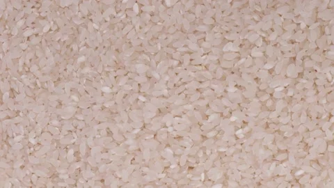 Raw rice close-up rotation slow mo Stock Footage 146705249