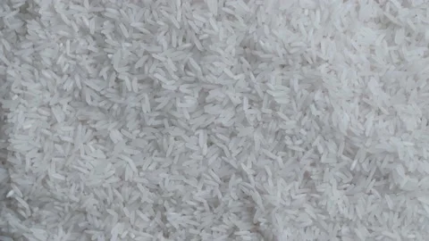 Raw Rice Grains Rotating Pattern Pile Of Cereal Long Seeds Rice Close Up 스톡 동영상 152812053