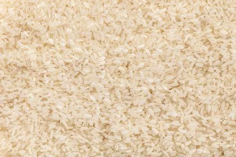 Raw rice texture closeup Stock Photos