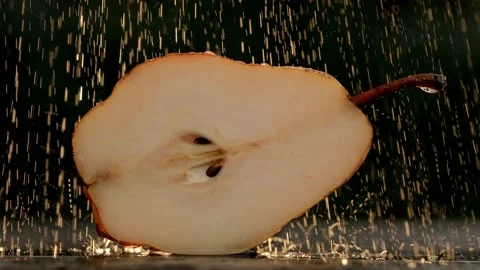 Raw ripe pear cut in half. Stock Footage 214791668