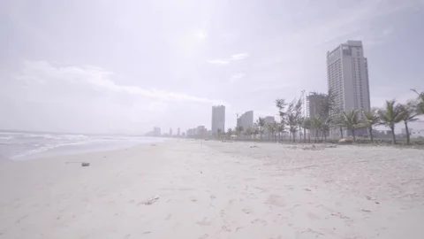 Raw S-Log 2 Footage of Empty Beach in Da Nang Vietnam with Buildings in Back Stock Footage 124210882