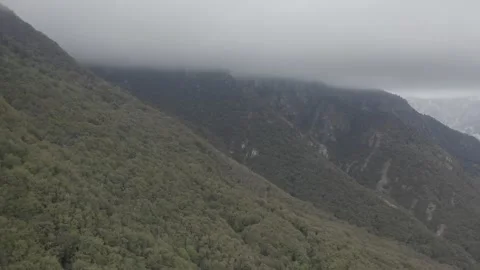RAW S-LOG Dronie with mountain view Stock Footage 145830291