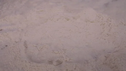 Raw salmon falling into flour slow motion 4k Stock Footage 148325983