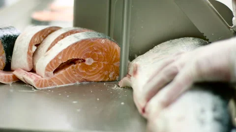 Raw salmon fish slicing Stock Footage 63839597