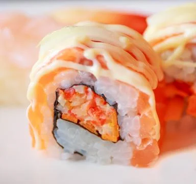 Raw salmon roll sushi Stock Photos
