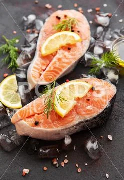 Raw salmon steaks Stock Photos