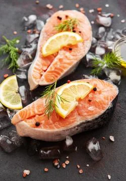 Raw salmon steaks Stock Photos